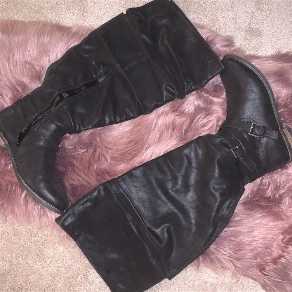 Torrid knee high extra wide calf black boots.